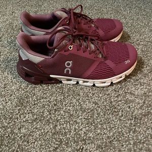 ON Cloudflyer magenta/mulberry color.